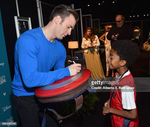 Actor Chris Evans of CAPTAIN AMERICA: CIVIL WAR and actor Miles Brown took part today in "Worlds, Galaxies, and Universes: Live Action at The Walt...