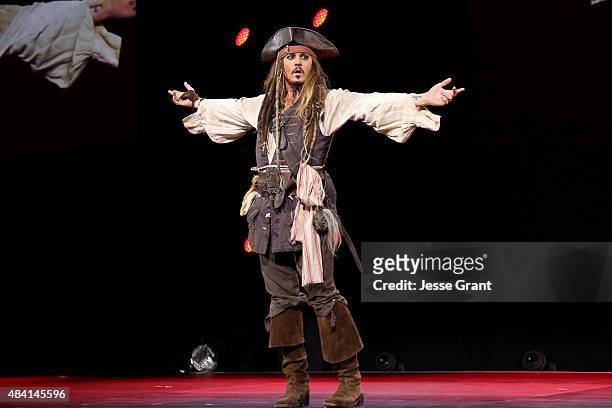 Actor Johnny Depp, dressed as Captain Jack Sparrow, of PIRATES OF THE CARIBBEAN: DEAD MEN TELL NO TALES took part today in "Worlds, Galaxies, and...