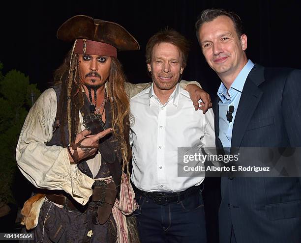 Actor Johnny Depp, dressed as Captain Jack Sparrow and producer Jerry Bruckheimer of PIRATES OF THE CARIBBEAN: DEAD MEN TELL NO TALES with President...