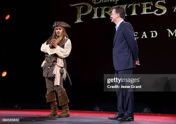 Actor Johnny Depp, dressed as Captain Jack Sparrow, of PIRATES OF THE CARIBBEAN: DEAD MEN TELL NO TALES and President of Walt Disney Studios Motion...