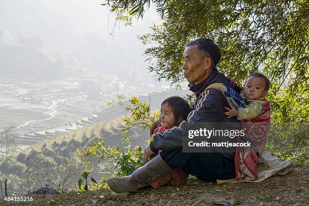 local vietnamese hmong tribe family - vietnamese people stock pictures, royalty-free photos & images
