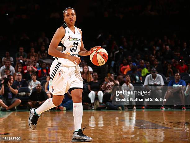 Tanisha Wright of the New York Liberty handles the ball against the Tulsa Shock on August 15, 2015 at Madison Square Garden, New York City , New...