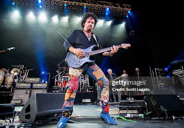 Steve Lukather of TOTO performs at Freedom Hill Amphitheater on August 15, 2015 in Sterling Heights, Michigan.