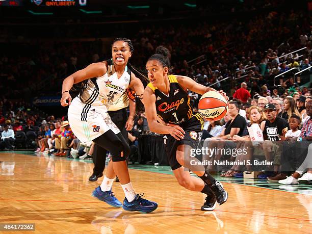 Brianna Kiesel of the Tulsa Shock drives to the basket against Brittany Boyd of the New York Liberty on August 15, 2015 at Madison Square Garden, New...