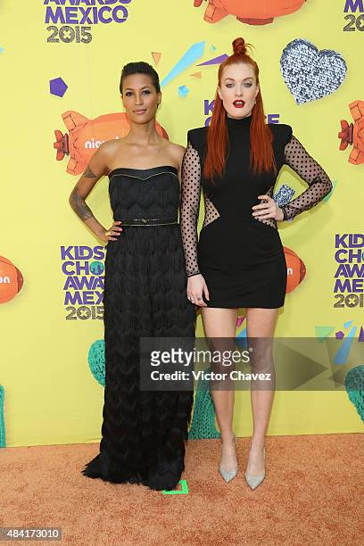Musicians Aino Jawo and Caroline Hjelt of Icona Pop arrive at Nickelodeon Kids' Choice Awards Mexico 2015 Red Carpet at Auditorio Nacional on August...
