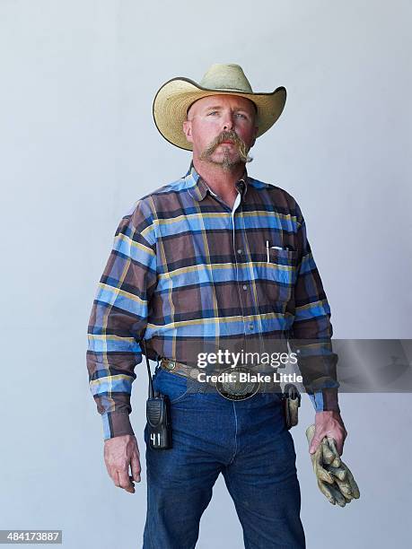cowboy worker handlebar moustache - cowboy hat stock-fotos und bilder