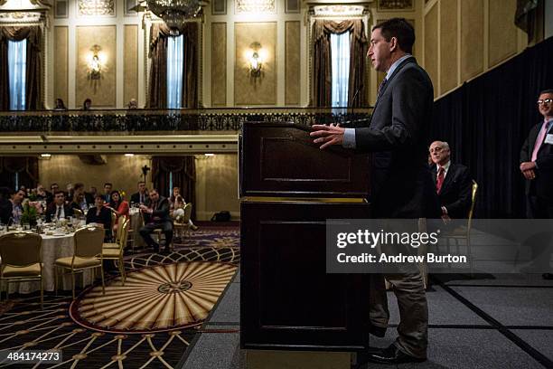 Investigative reporter Glenn Greenwald, who worked with National Security Agency leaker Edward Snowden, accepts the George Polk Award along side...