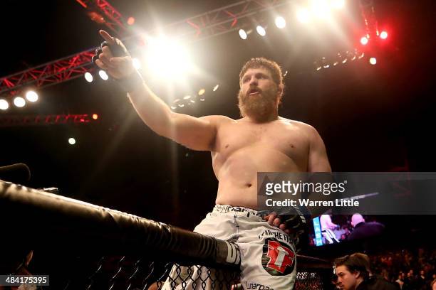 Roy Nelson celebrates his knockout victory against Antonio Rodrigo Nogueira in their heavyweight bout during UFC Fight Night 39 at du Arena on April...