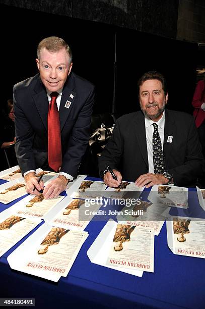 Governor of the United States Postal Service, Mickey D. Barnett and director Fraser Heston attend the postage stamp ceremony during the 2014 TCM...