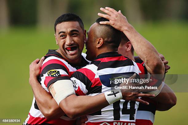 Toni Pulu of Counties Manukau celebrates with Jimmy Tupou and Sam Henwood after scoring a try during the round one ITM Cup match between Counties...