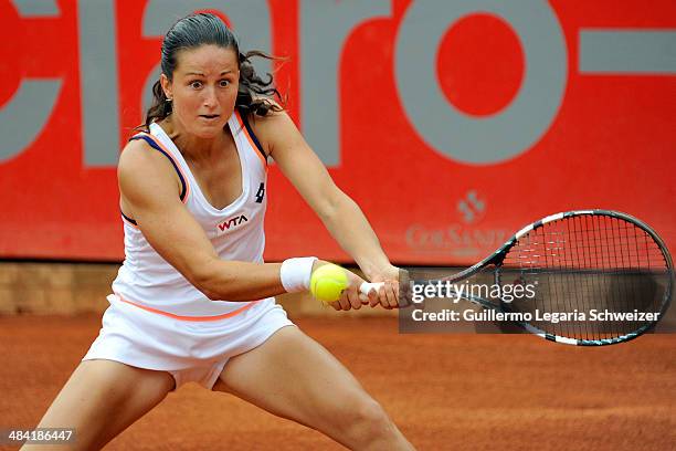 Lara Arruabarrena of Spain returns the ball to Jalena Jankovic of Serbia during the WTA Bogota Open quaterfinal match at El Rancho Club in Bogota on...