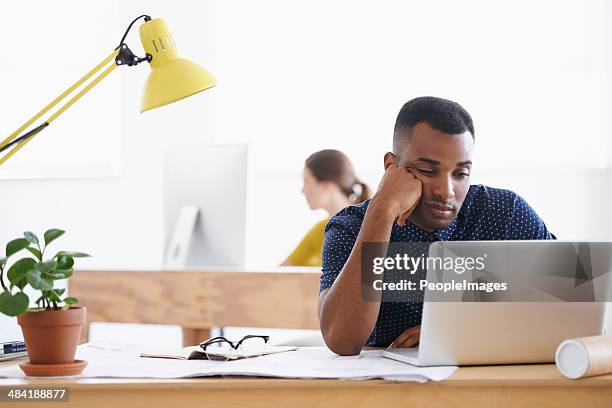 another mind-numbing day at work.... - sitting slouched stock pictures, royalty-free photos & images