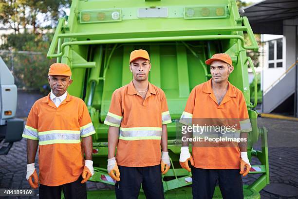 garbage collection- the men who make it happen - garbage collector stock pictures, royalty-free photos & images