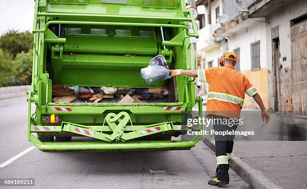 back where you belong! - garbage truck stock pictures, royalty-free photos & images