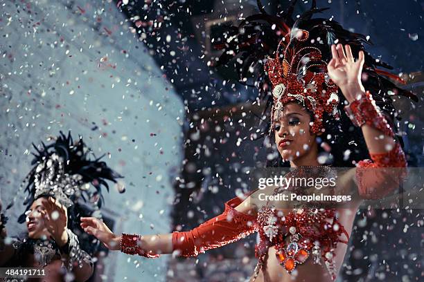 fiery festival dancers - brazilian carnival stock pictures, royalty-free photos & images
