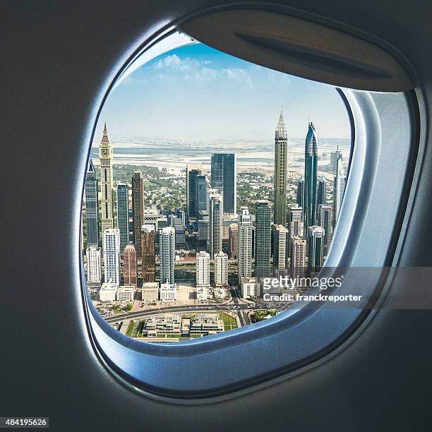 dubai skyline from the airplane - panorama dubai stockfoto's en -beelden