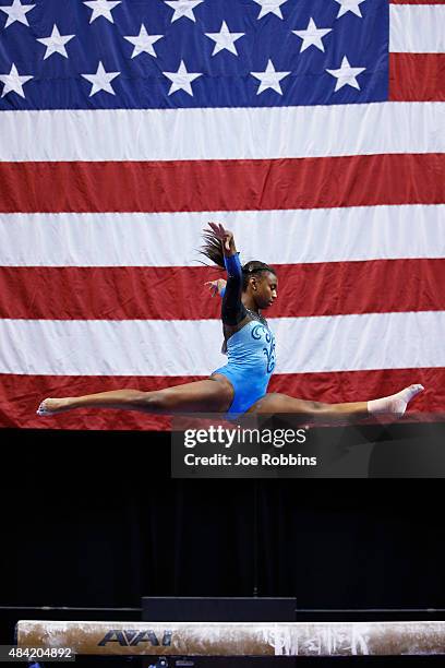 Nia Dennis competes in the women's finals of the 2015 P&G Gymnastics Championships at Bankers Life Fieldhouse on August 15, 2015 in Indianapolis,...