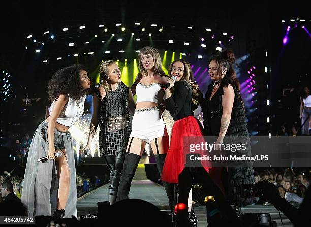 Taylor Swift , Leigh-Anne Pinnock, Perrie Edwards, Jesy Nelson and Jade Thirlwall of Little Mix perform together during Swift's "The 1989 World Tour"...