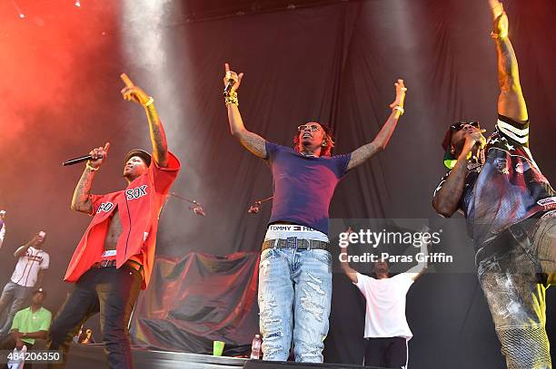 Rapper YG, rapper Rich Homie Quan, and rapper Jeezy perform in concert at Aarons Amphitheatre at Lakewood on August 15, 2015 in Atlanta, Georgia.