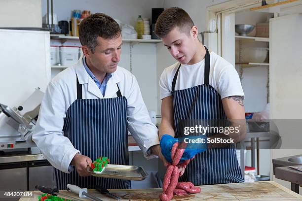 apprentice butcher - butcher stock pictures, royalty-free photos & images