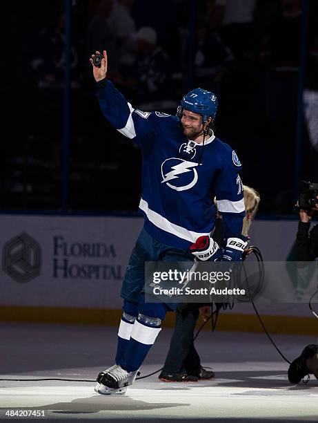 Victor Hedman of the Tampa Bay Lightning thanks fans for their support during the win against the Toronto Maple Leafs at the Tampa Bay Times Forum on...