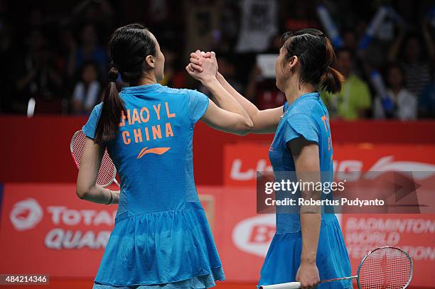 Tian Qing and Zhao Yunlei of China react after defeating Christinna Pedersen and Kamilla Rytter Juhl of Denmark in the women doubles final match of...