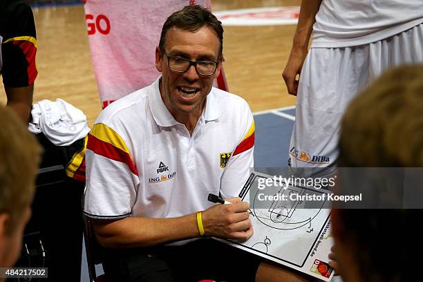 Head coach Chris Fleming of Germany sspeaks to the team during the men's Basketball friendly match between Germany and Croatia at OEVB-Arena on...