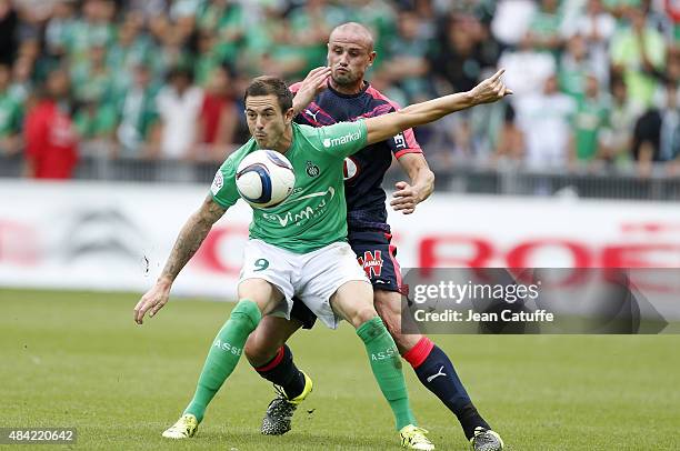 Nolan Roux of Saint-Etienne and Nicolas Pallois of Bordeaux in action during the French Ligue 1 match between AS Saint-Etienne and FC Girondins de...