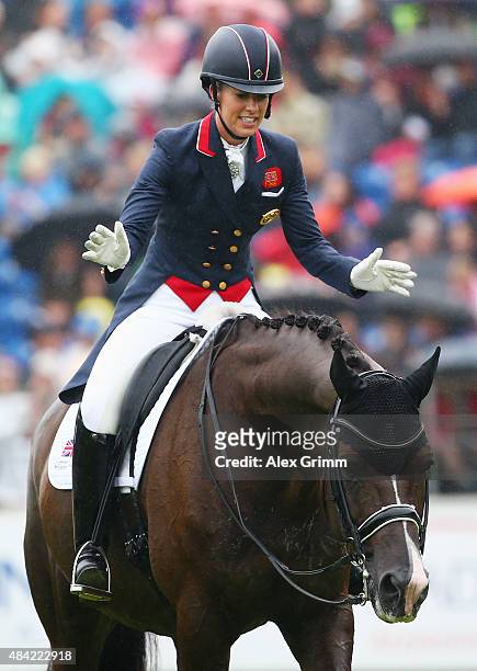 Charlotte Dujardin of Great Britain celebrates on her horse Valegro after winning the Dressage Grand Prix Freestyle individual competition on Day 5...