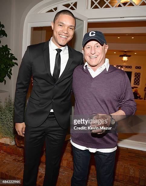 Trevor Noah and Ronald O. Perelman attend Apollo in the Hamptons 2015 at The Creeks on August 15, 2015 in East Hampton, New York.