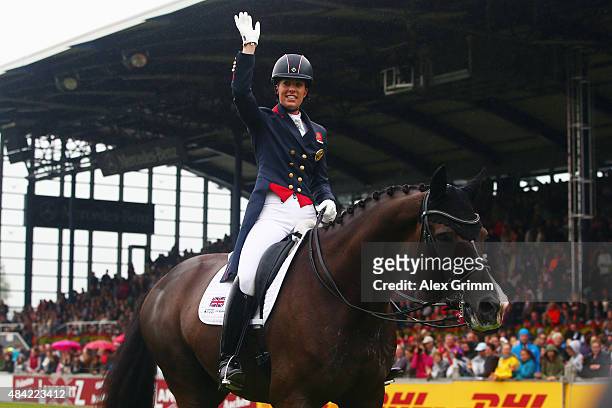 Charlotte Dujardin of Great Britain celebrates winning the Dressage Grand Prix Freestyle individual competition on Day 5 of the FEI European...