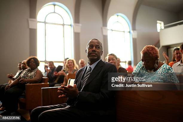 Republican presidential hopeful Ben Carson looks on during church services at Maple Street Missionary Baptist Church on August 16, 2015 in Des Moines...