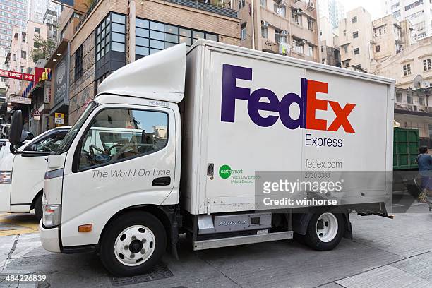 fedex express - fedex plane stock pictures, royalty-free photos & images