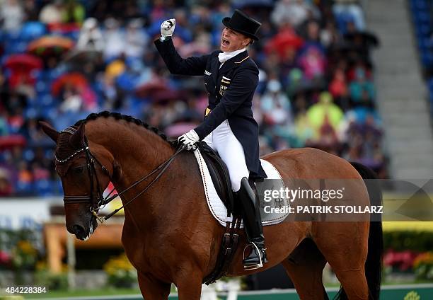 Isabell Werth of Germany on her horse Don Johnson competes during the Grand Prix Freestyle Dressage Individual Final during the FEI European...