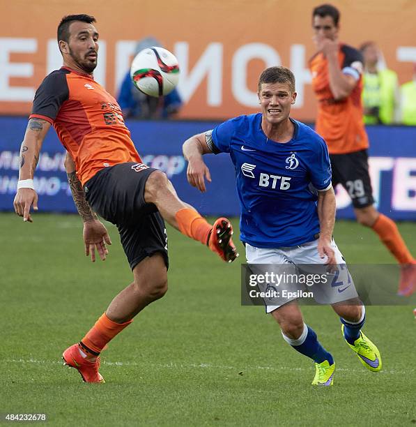 Igor Denisov of FC Dinamo Moscow is challenged by Rohas Asevedo of FC Ural Sverdlovsk Oblast during the Russian Premier League match between Dinamo...