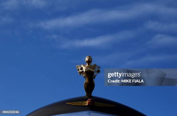 The hood ornament of a 1936 Cadillac 90 Fleetwood Convertible Sedan is seen during the Concours d'Elegance on August 16, 2015 in Pebble Beach,...