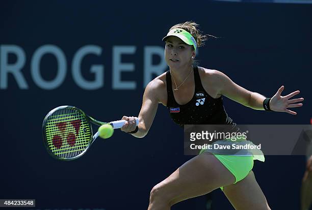 Belinda Bencic of Switzerland plays a shot against Simona Halep of Romania during the finals match on Day 7 of the Rogers Cup at the Aviva Centre on...