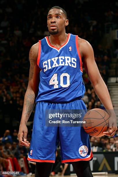 April 9: Jarvis Varnado of the Philadelphia 76ers attempts a free throw against the Toronto Raptors on April 9, 2014 at the Air Canada Centre in...