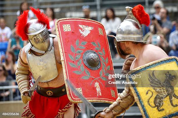 Performers reenacting a Roman age gladiator fight at Guildhall Yard in partnership with Museum of London in London, England on August 16, 2015.