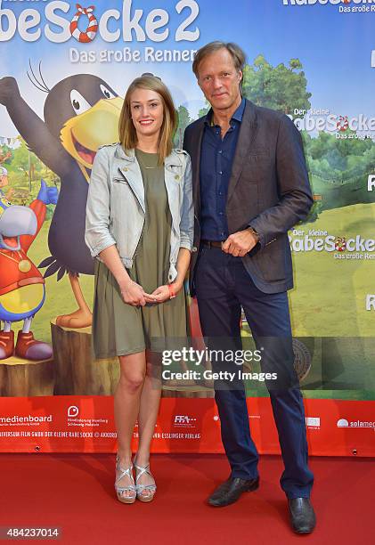 Gerhard Delling and daughter Katharina attend the German premiere for the film 'Der kleine Rabe Socke 2 - Das grosse Rennen' at Zeise Kinos on August...