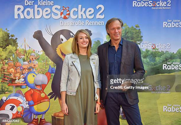 Gerhard Delling and daughter Katharina attend the German premiere for the film 'Der kleine Rabe Socke 2 - Das grosse Rennen' at Zeise Kinos on August...