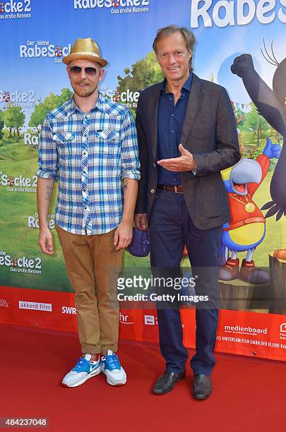 Jan Delay and Gerhard Delling attend the German premiere for the film 'Der kleine Rabe Socke 2 - Das grosse Rennen' at Zeise Kinos on August 16, 2015...