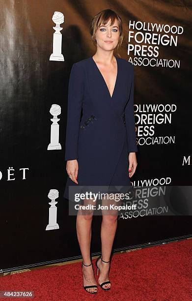 Actress Dakota Johnson arrives at Hollywood Foreign Press Association Hosts Annual Grants Banquet at the Beverly Wilshire Four Seasons Hotel on...