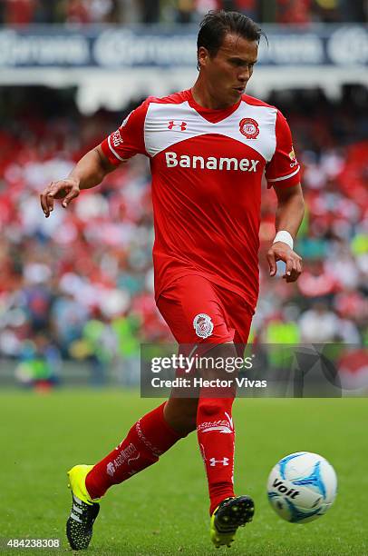 Aaron Galindo of Toluca drives the ball during a 5th round match between Toluca and Chivas as part of the Apertura 2015 Liga MX at Nemesio Diez...