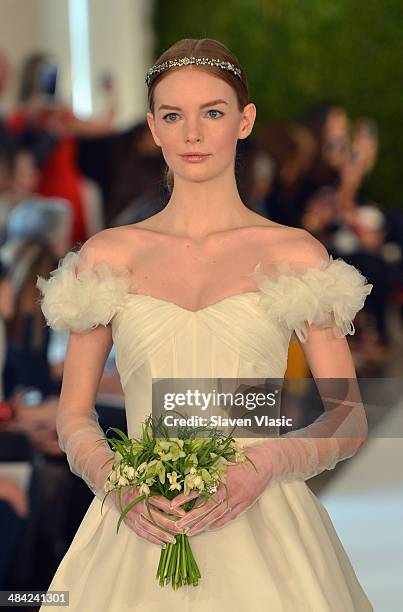 Model walks the runway at the Oscar De La Renta Spring 2015 Bridal collection show on April 11, 2014 in New York City.