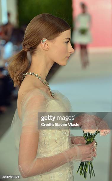 Model walks the runway at the Oscar De La Renta Spring 2015 Bridal collection show on April 11, 2014 in New York City.