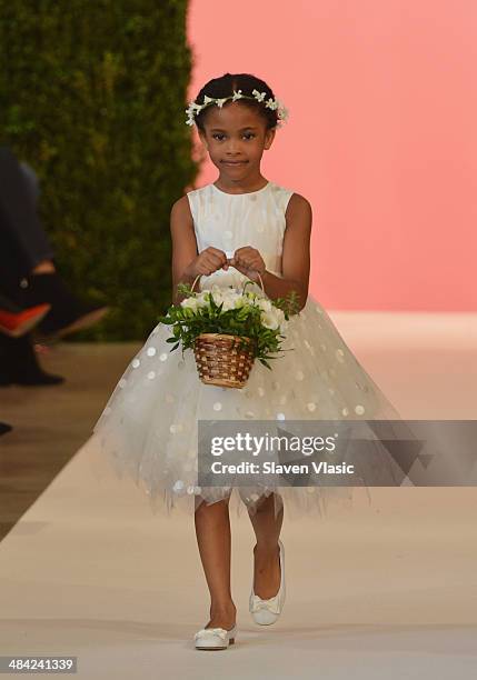 Model walks the runway at the Oscar De La Renta Spring 2015 Bridal collection show on April 11, 2014 in New York City.