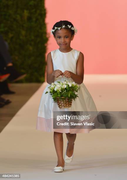 Model walks the runway at the Oscar De La Renta Spring 2015 Bridal collection show on April 11, 2014 in New York City.