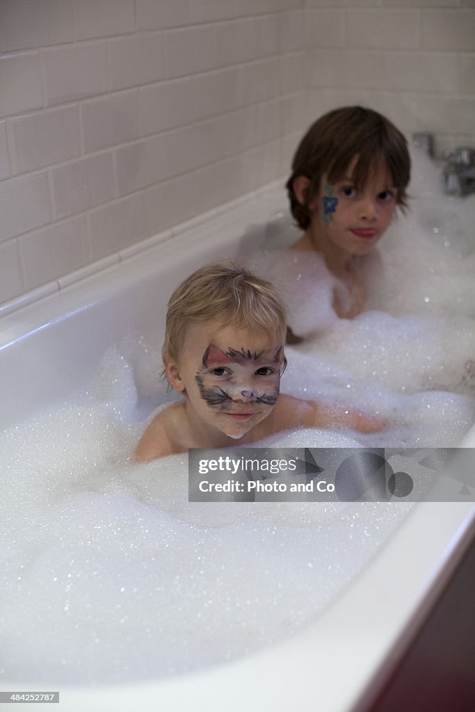 Children disguised in a bath