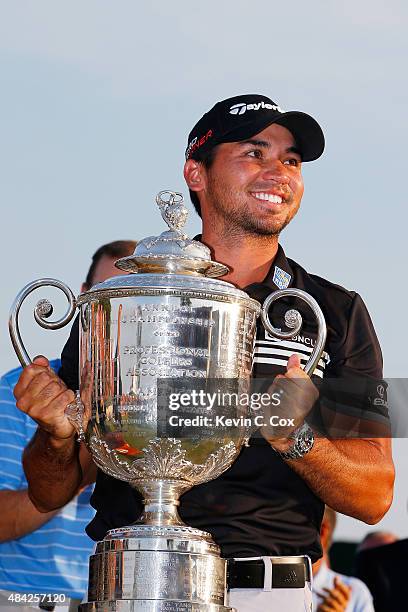 Jason Day of Australia celebrates with the Wanamaker Trophy after winning the 2015 PGA Championship with a score of 20-under par at Whistling Straits...